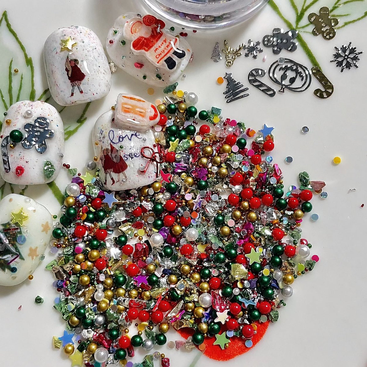 Mixed Christmas nail art decorations and decorated sample nails