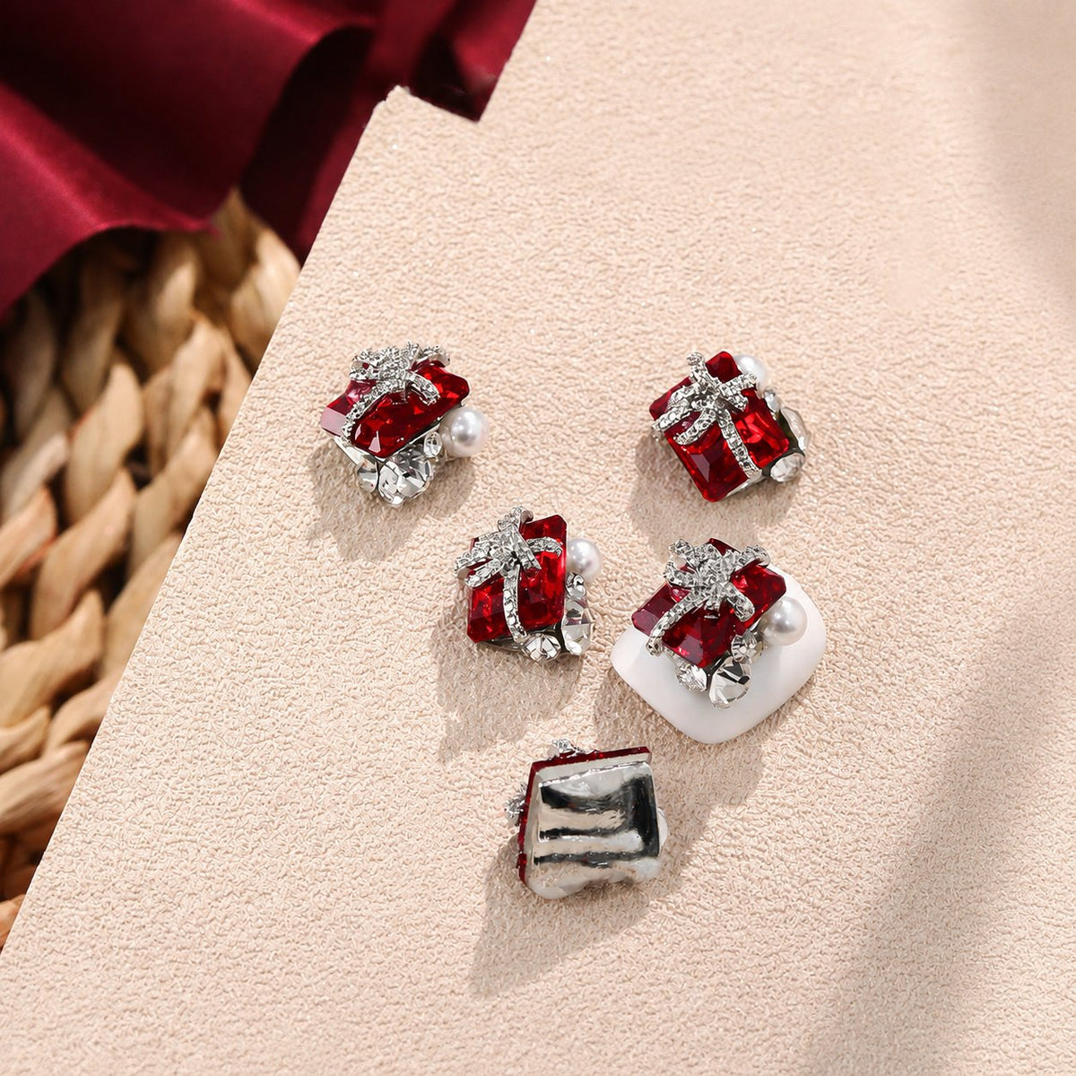 Red rectangular crystal nail charms with pearl accents