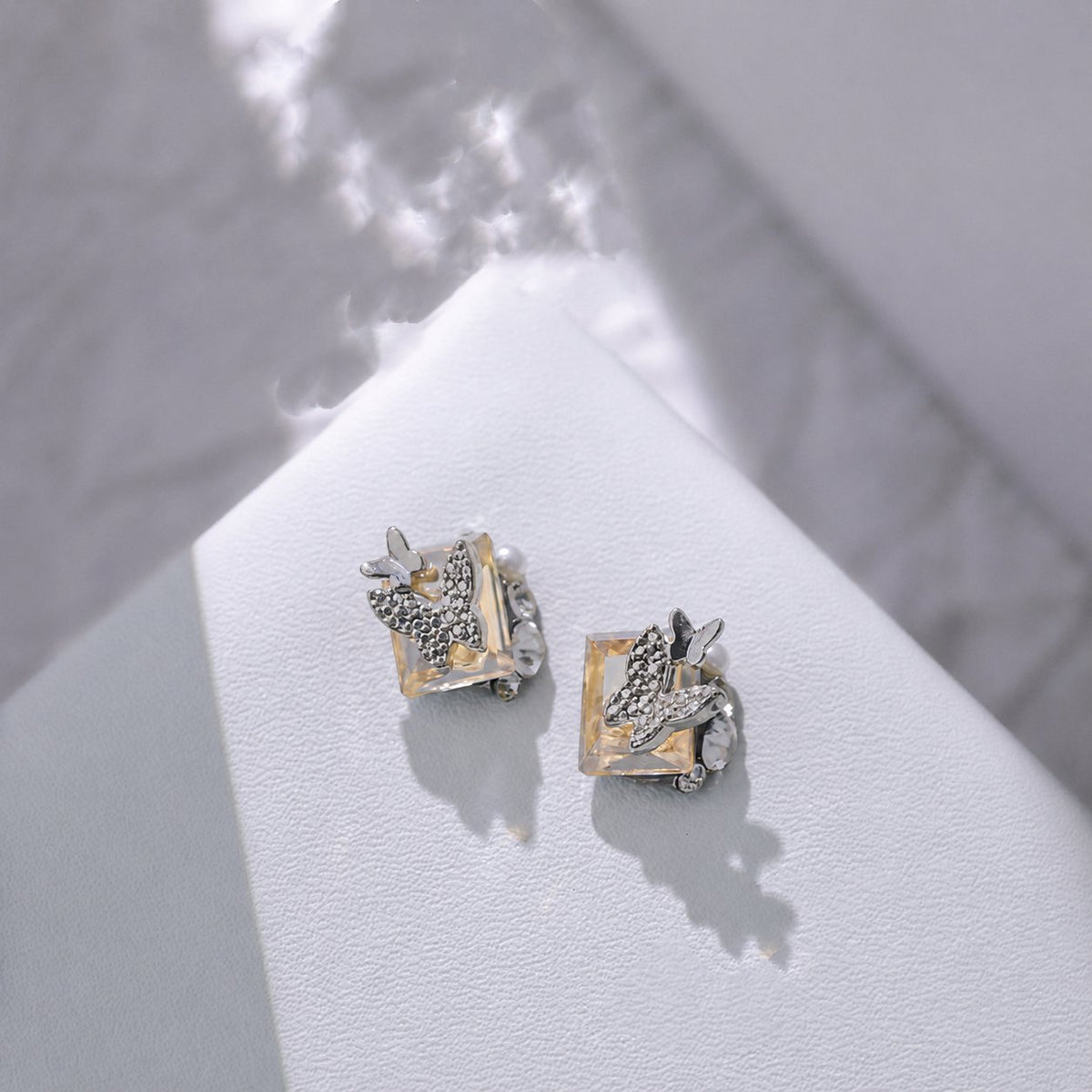 Champagne rectangular butterfly nail charms with pearl accents