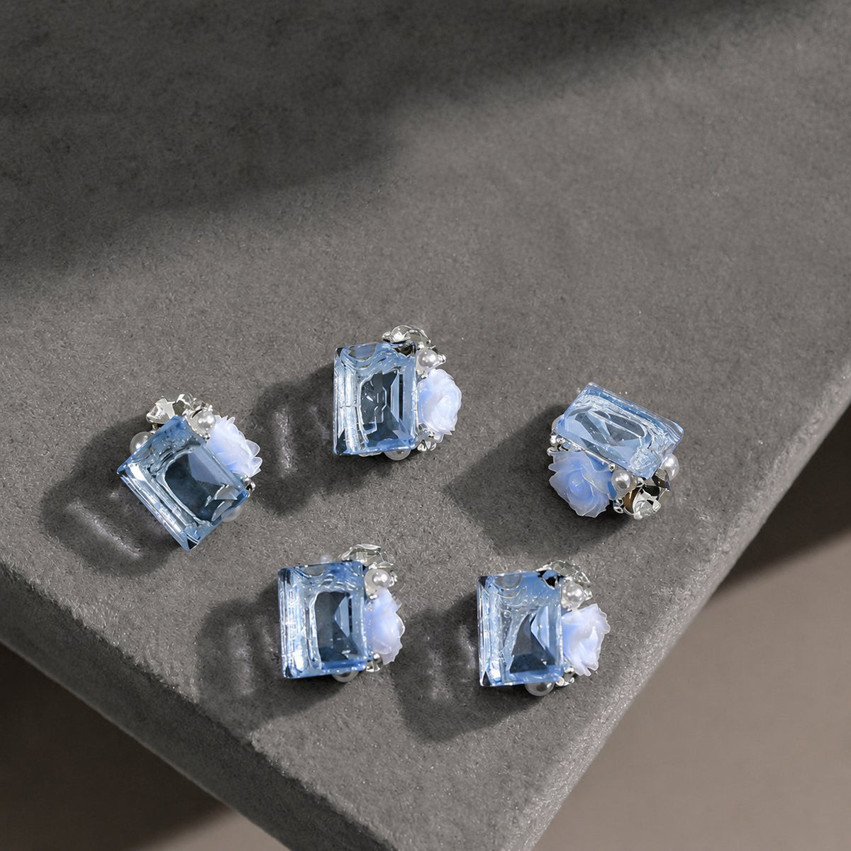 Light blue rectangular rose and pearl nail charms