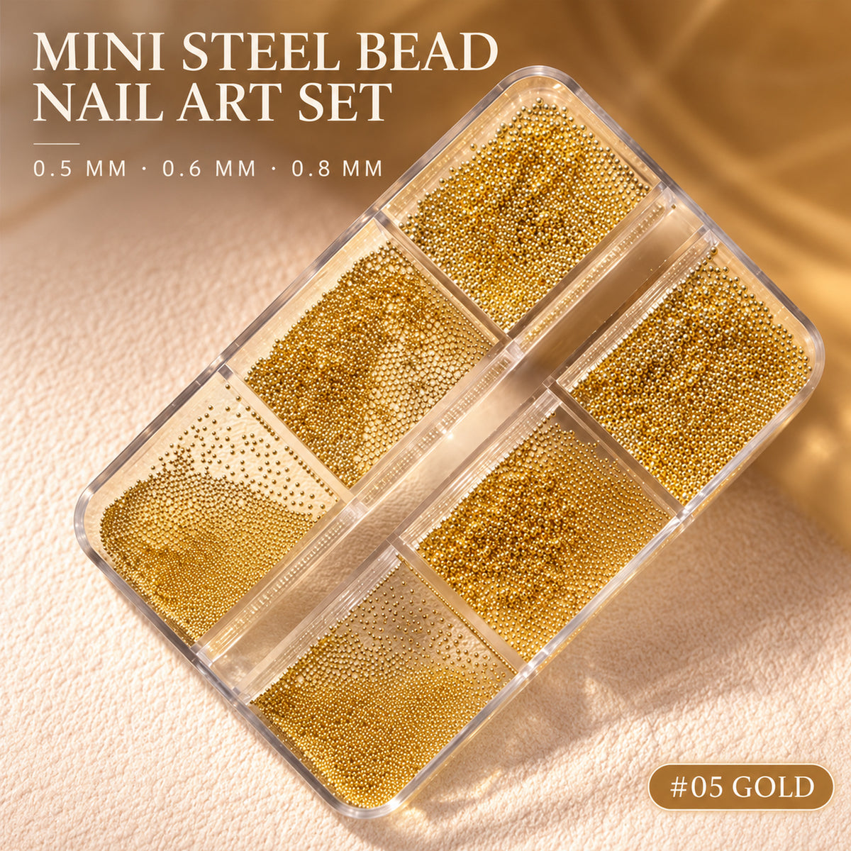 Gold mini steel bead nail art set #05 with six compartments featuring 0.5 mm, 0.6 mm and 0.8 mm beads.
2. #04 Black Hero