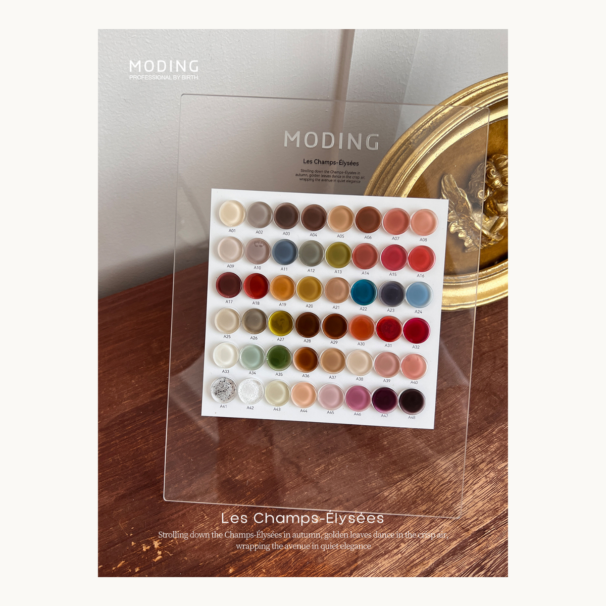 MODING Les Champs-Élysées 48-color gel collection displayed on acrylic stand