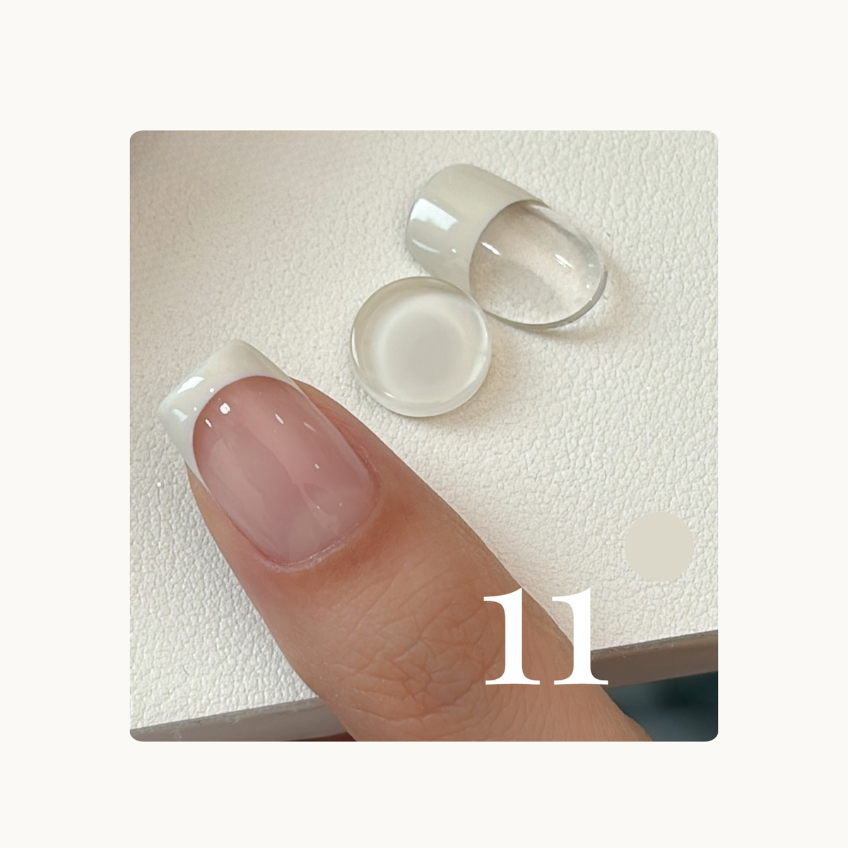 Oat Cream White French tip gel swatch on a natural nail