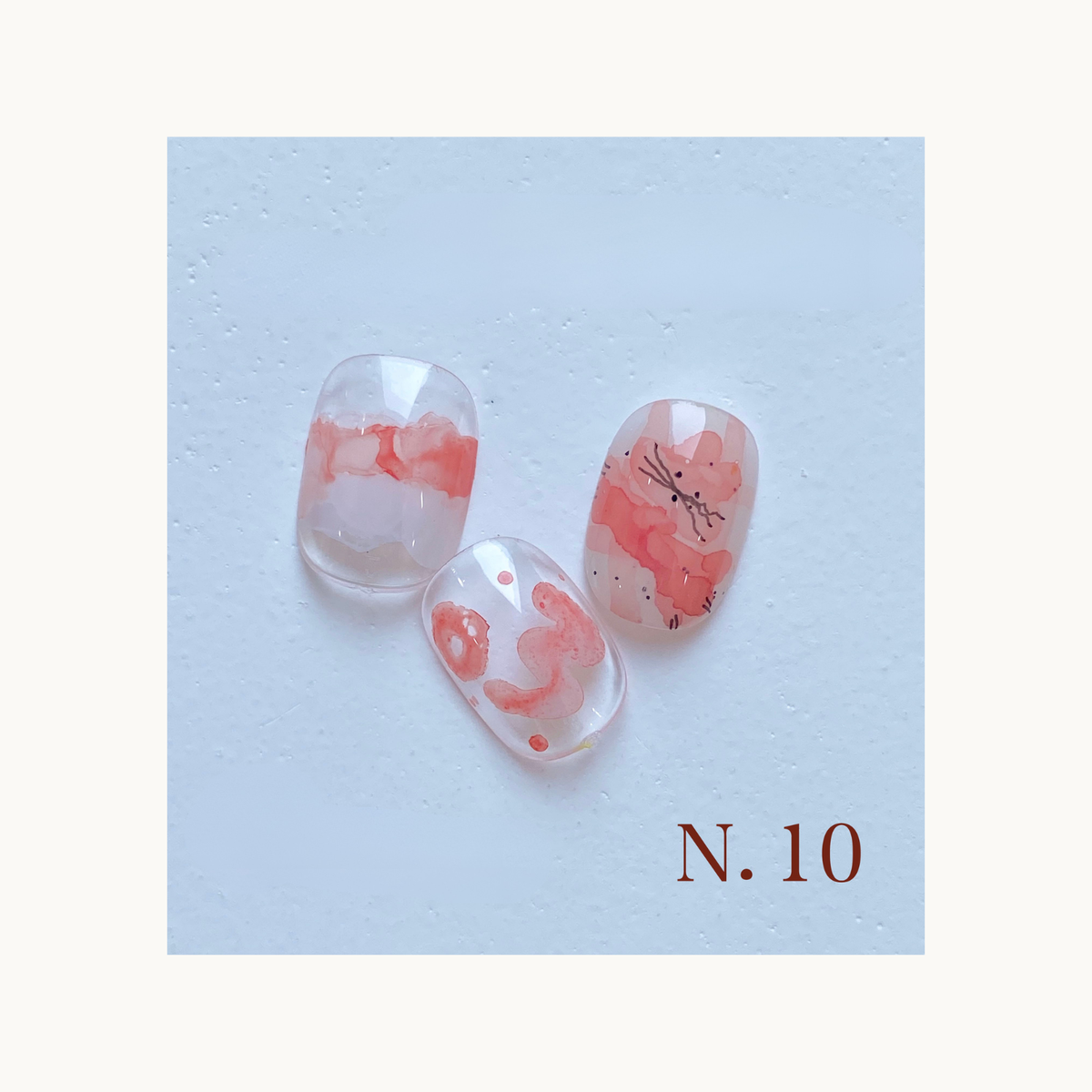 Peachy Coral Mist blooming ink nail art sample