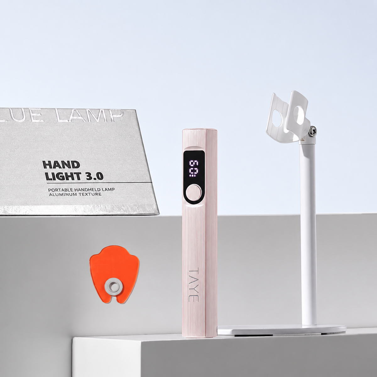 Pink TAYE Hand Light 3.0 lamp with stand and product booklet