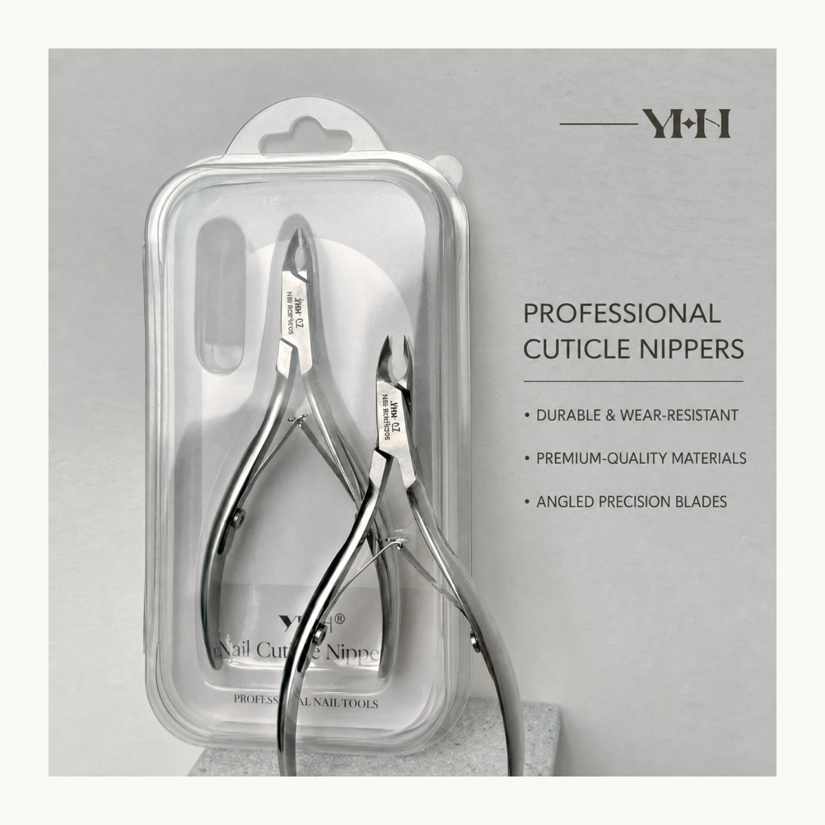YHH Jaw 12 professional cuticle nippers with precision angled blades and protective storage case for salon manicures.