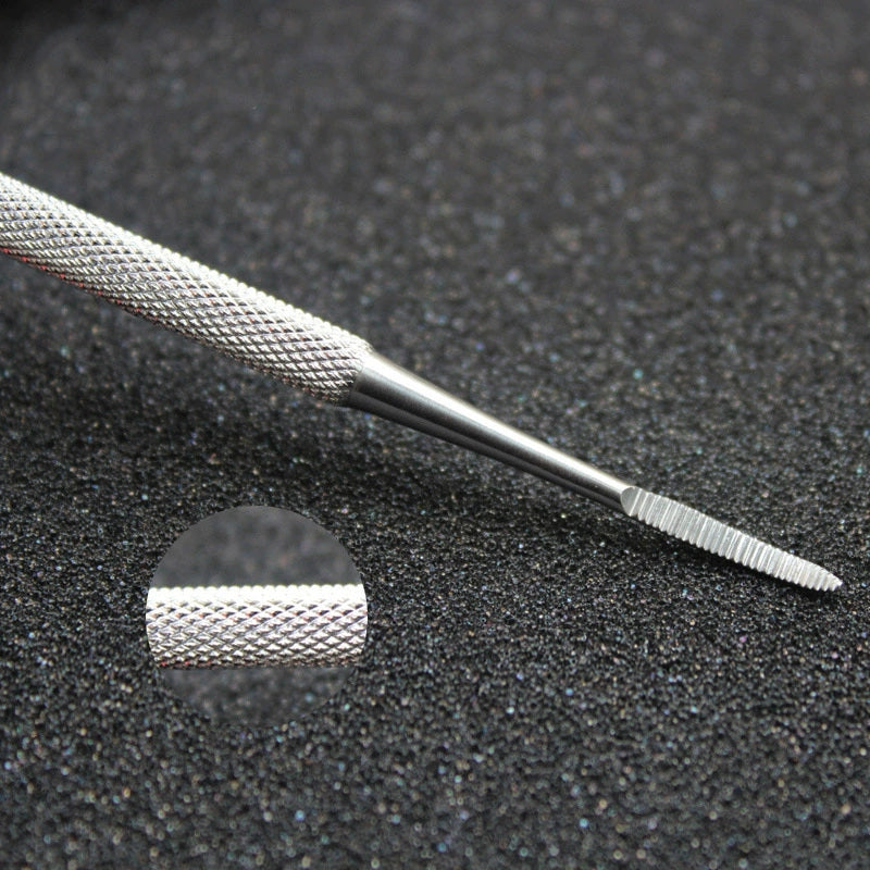 Close-up of the textured grip and curved filing end
