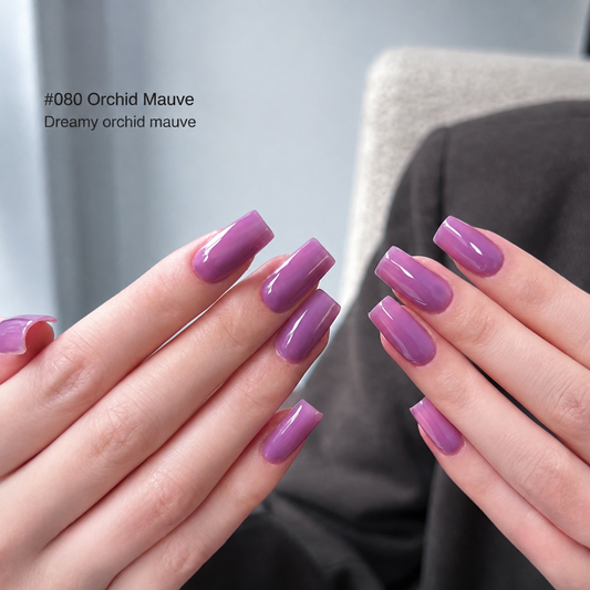 Orchid Mauve medium purple glossy nail color gel manicure on two hands