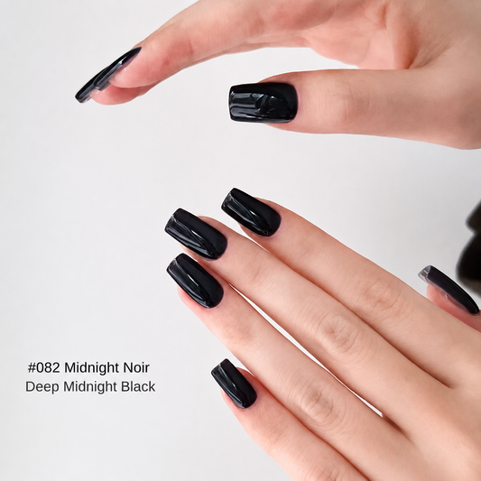 Midnight Noir deep black glossy nail color gel manicure on two hands