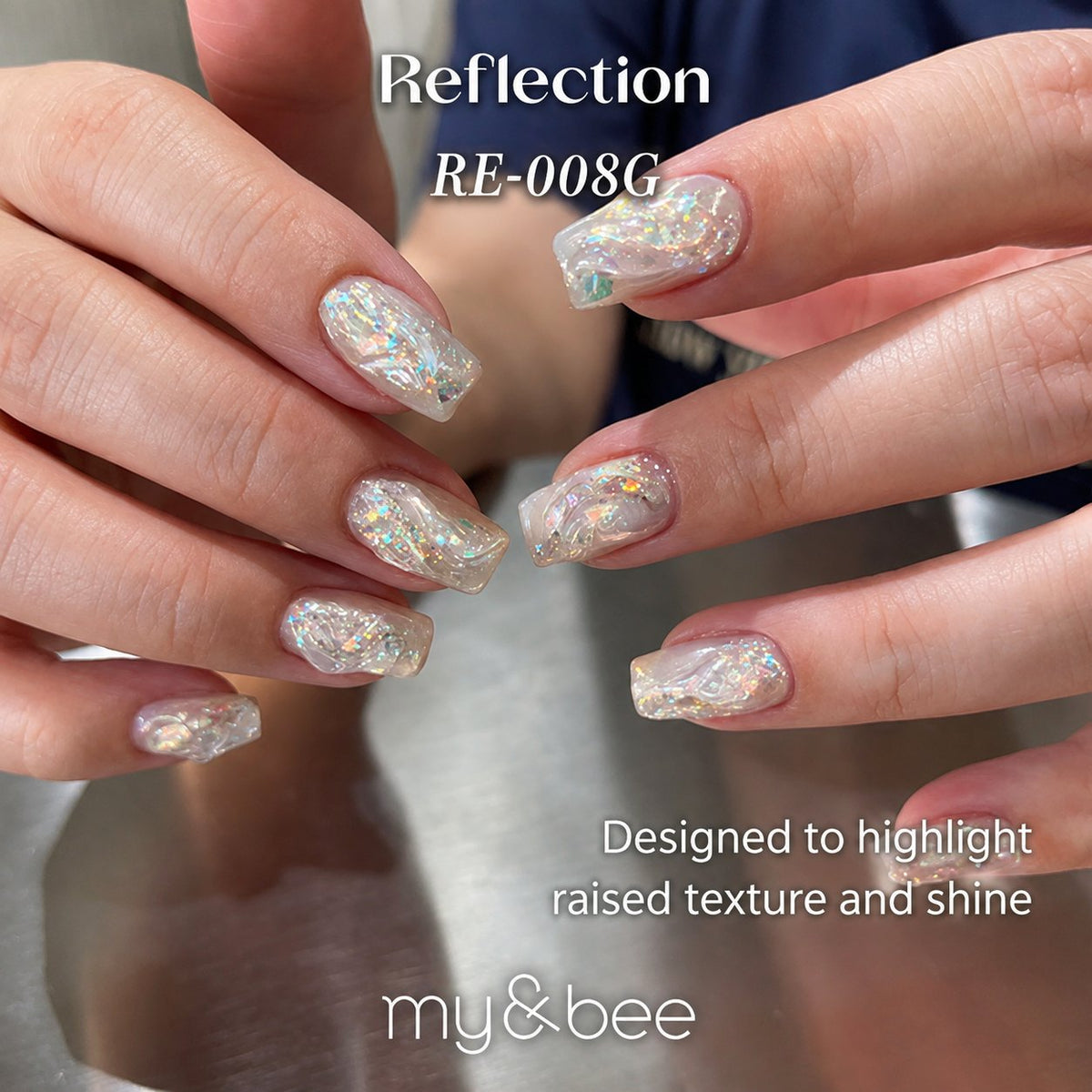 RE-008G clear glitter manicure with silver and multicolor flakes