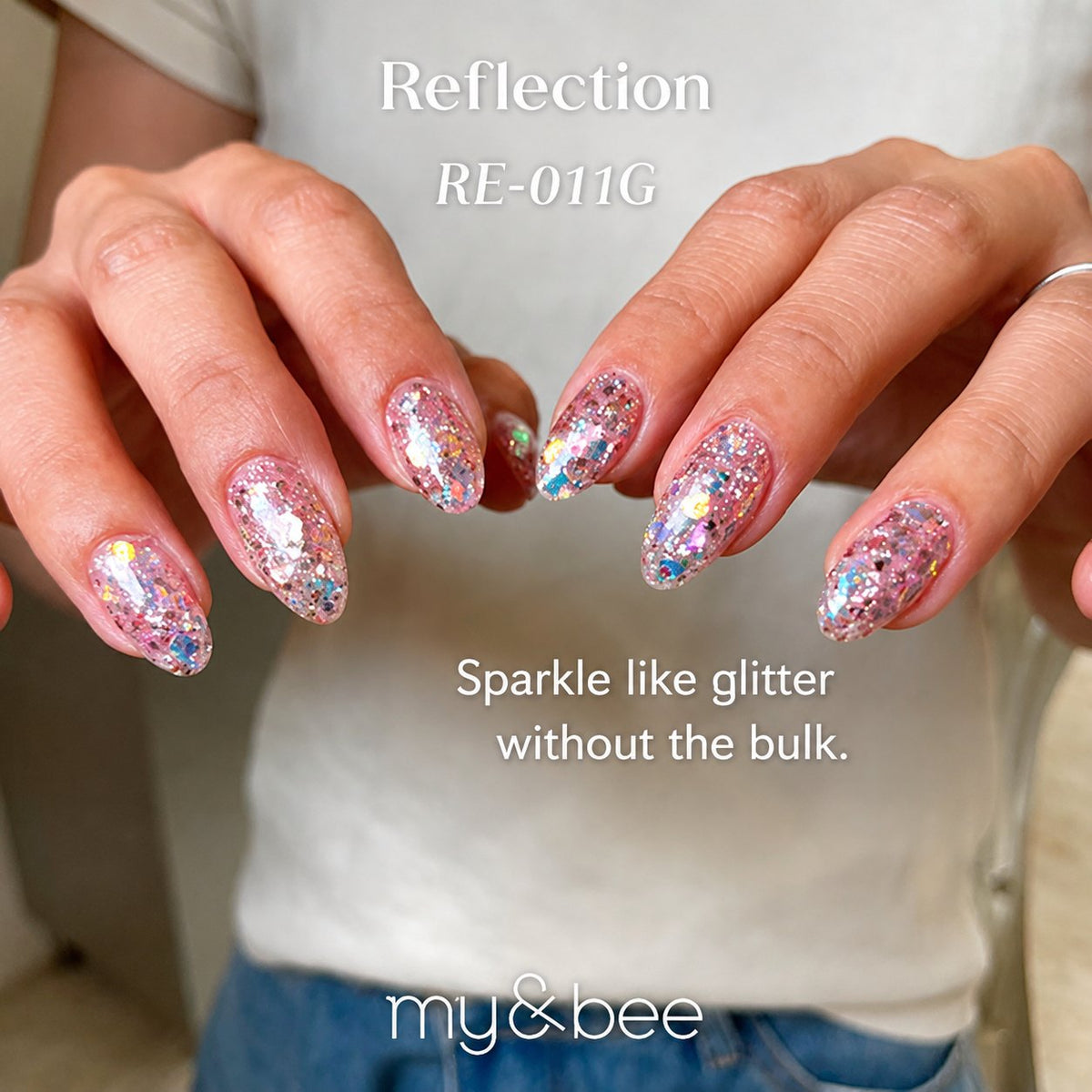 RE-011G pale pink reflective glitter gel manicure on long almond nails