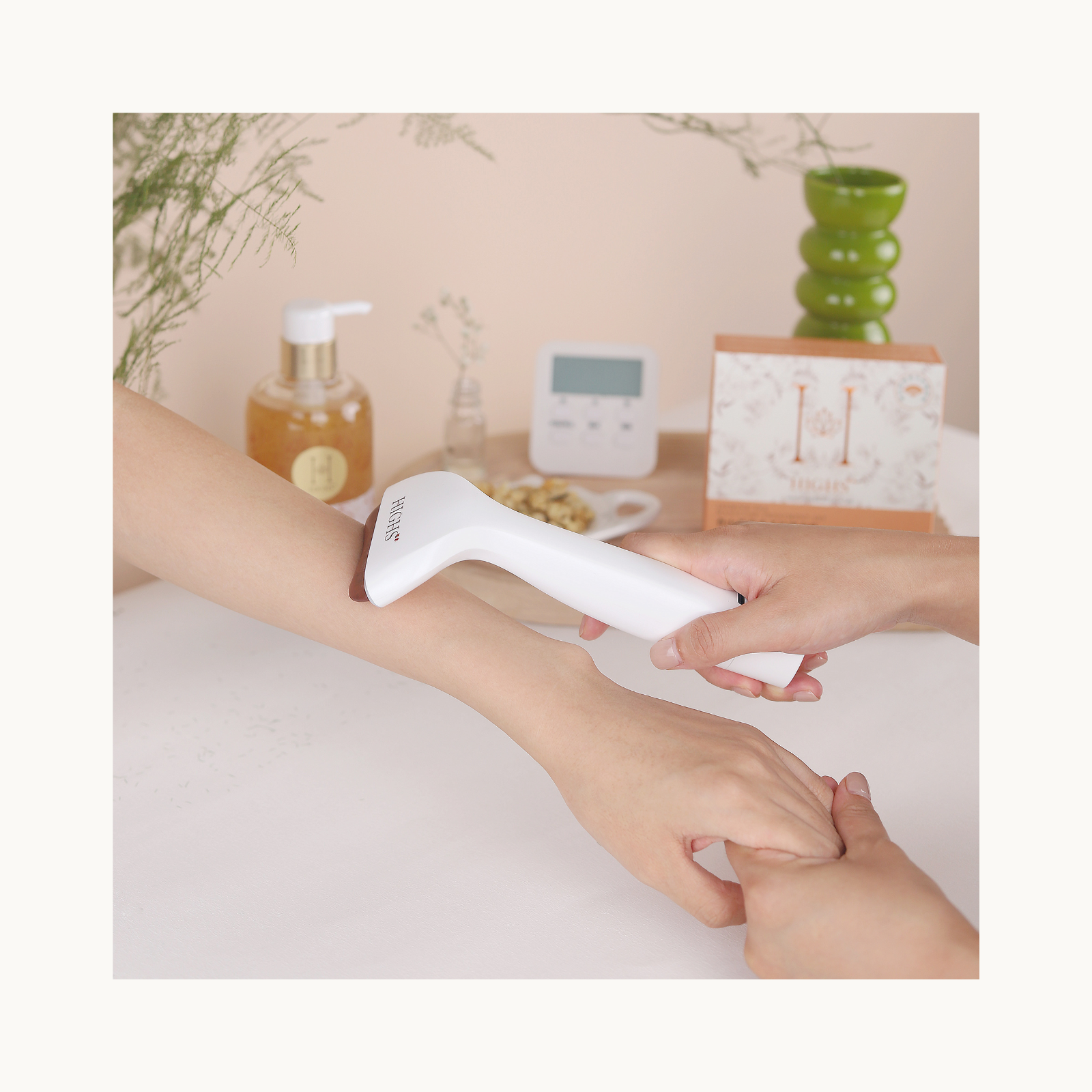 Demonstration of HIGHS heated vibrating gua sha massager used on arm for relaxation and circulation
