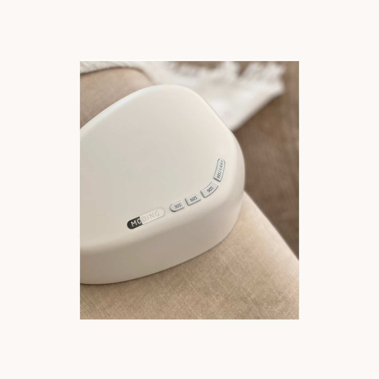 Close-up of MODING M1s nail lamp control buttons showing 30s 60s 90s timer settings
