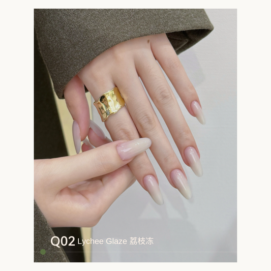 Q02 sheer pink-to-white extension gel manicure on long almond nails