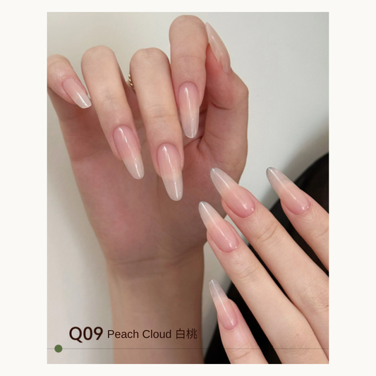 Translucent peach-pink almond nails with a soft gradient, MODING Q09