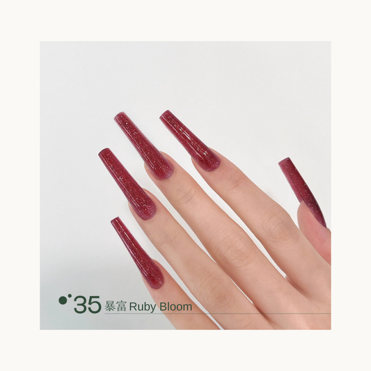 Ruby-red glitter nails in a long square shape, MODING Q35