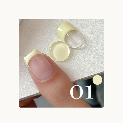 French tip gel swatch in shade 01 cream yellow, showing smooth one-stroke application on nail.