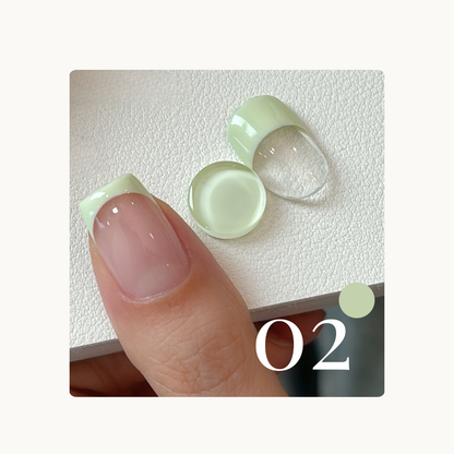 French tip gel swatch in shade 02 light avocado green, with clean one-stroke smile line.