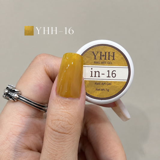 In-16 semi-transparent gel nail polish swatch in glossy amber mustard gold