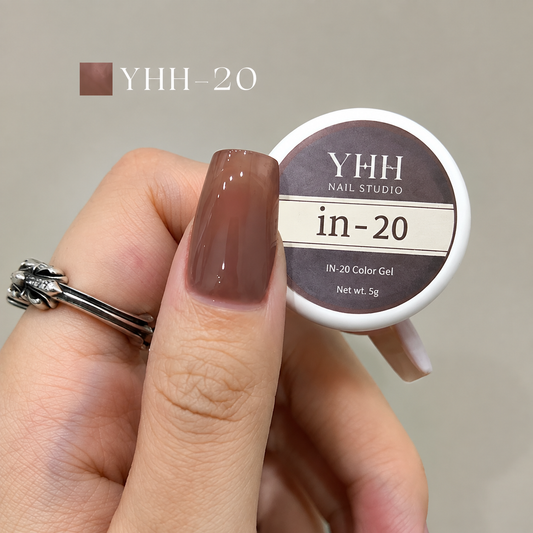 In-20 semi-transparent gel nail polish swatch in glossy taupe brown