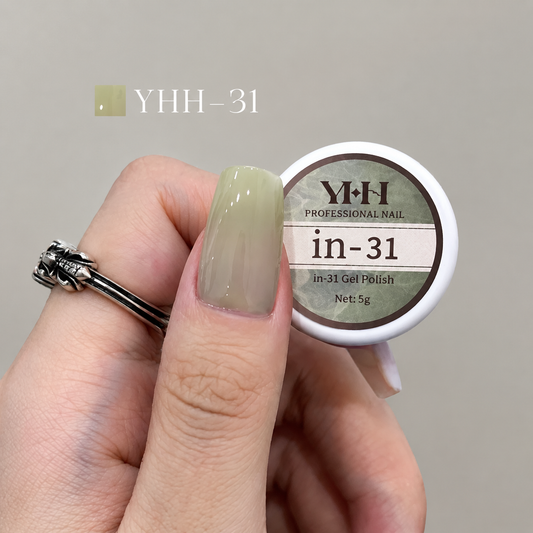 In-31 semi-transparent gel nail polish swatch in glossy pale sage olive