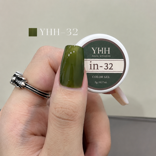 In-32 semi-transparent gel nail polish swatch in glossy deep olive green