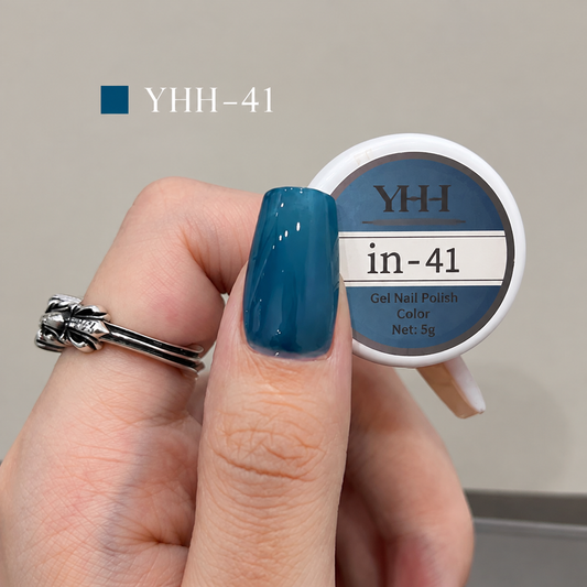 In-41 semi-transparent gel nail polish swatch in glossy deep cyan blue