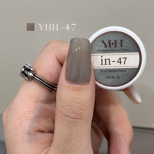 Gray taupe nail color gel sample on a glossy painted nail