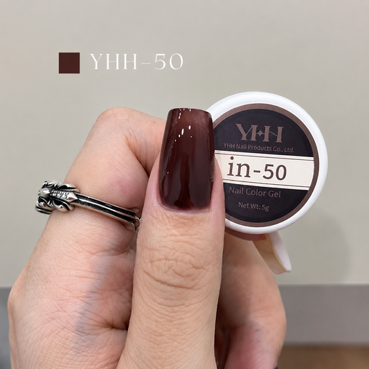 Deep burgundy nail color gel sample on a glossy painted nail
