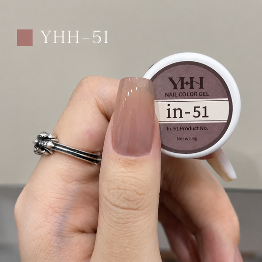 Sheer mauve pink nail color gel sample on a glossy painted nail