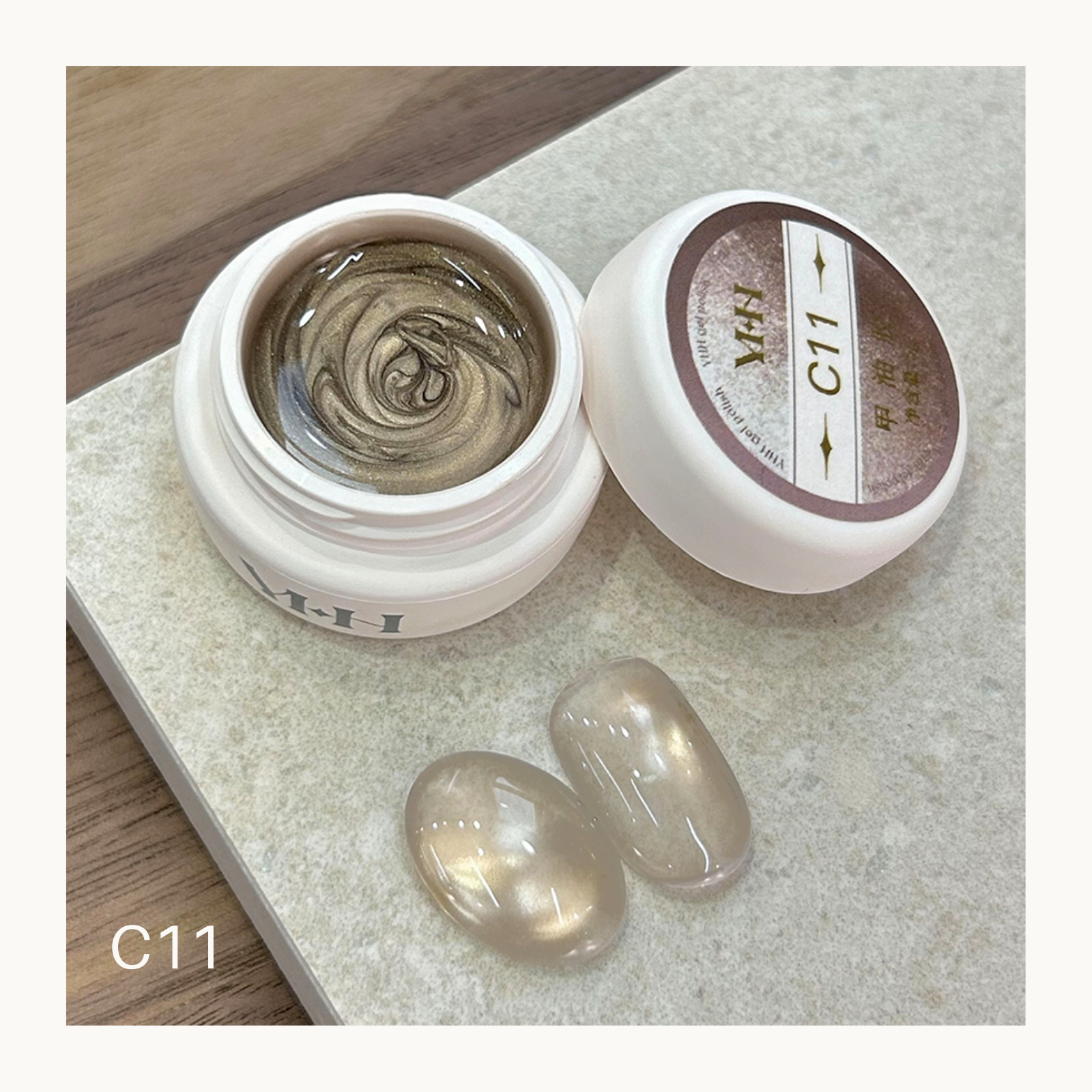 YHH C11 soft milky pearl cat eye gel swatch in pot showing translucent nude shimmer magnetic nail color