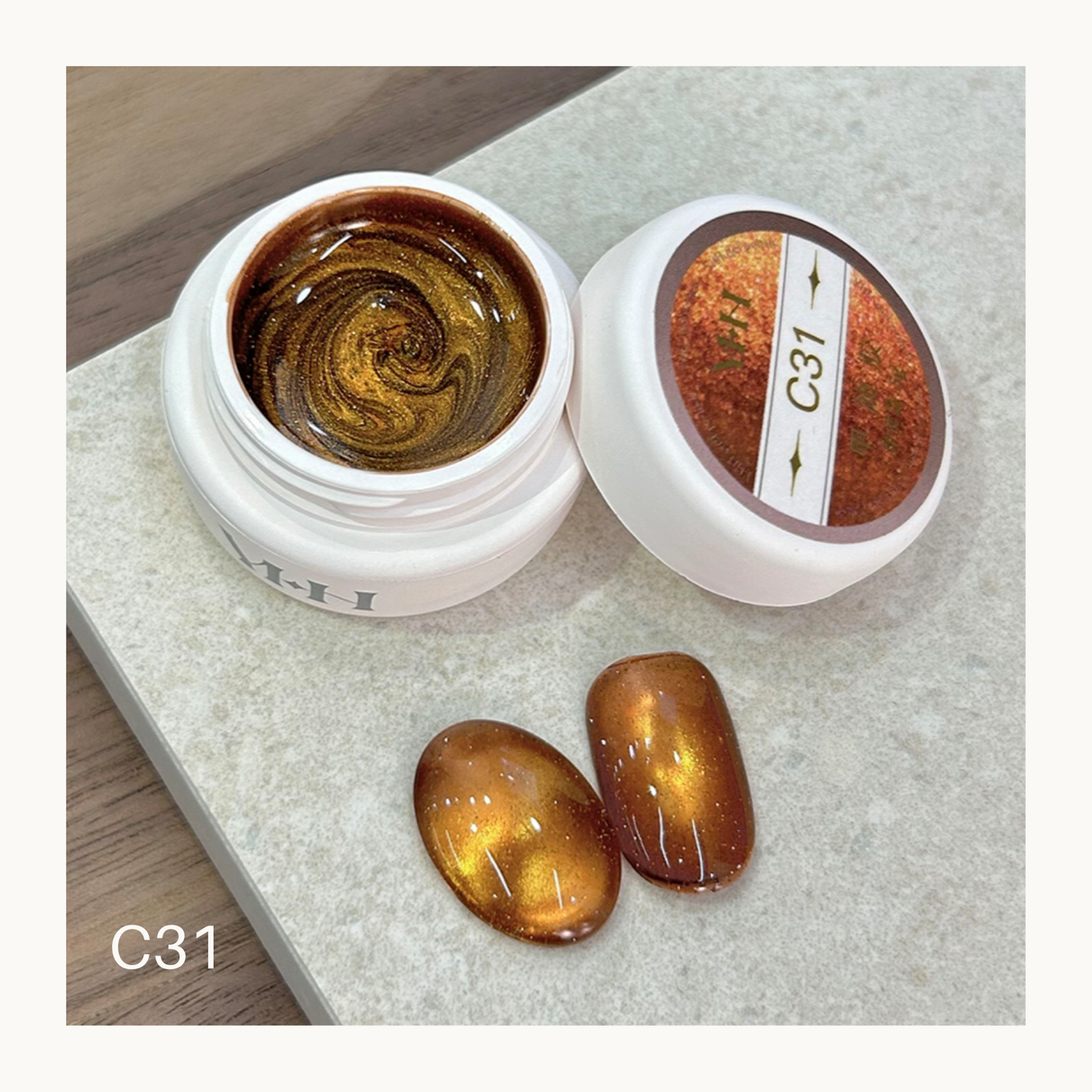 YHH C31 burnt autumn cat eye gel polish with warm amber brown magnetic shimmer nail art swatch