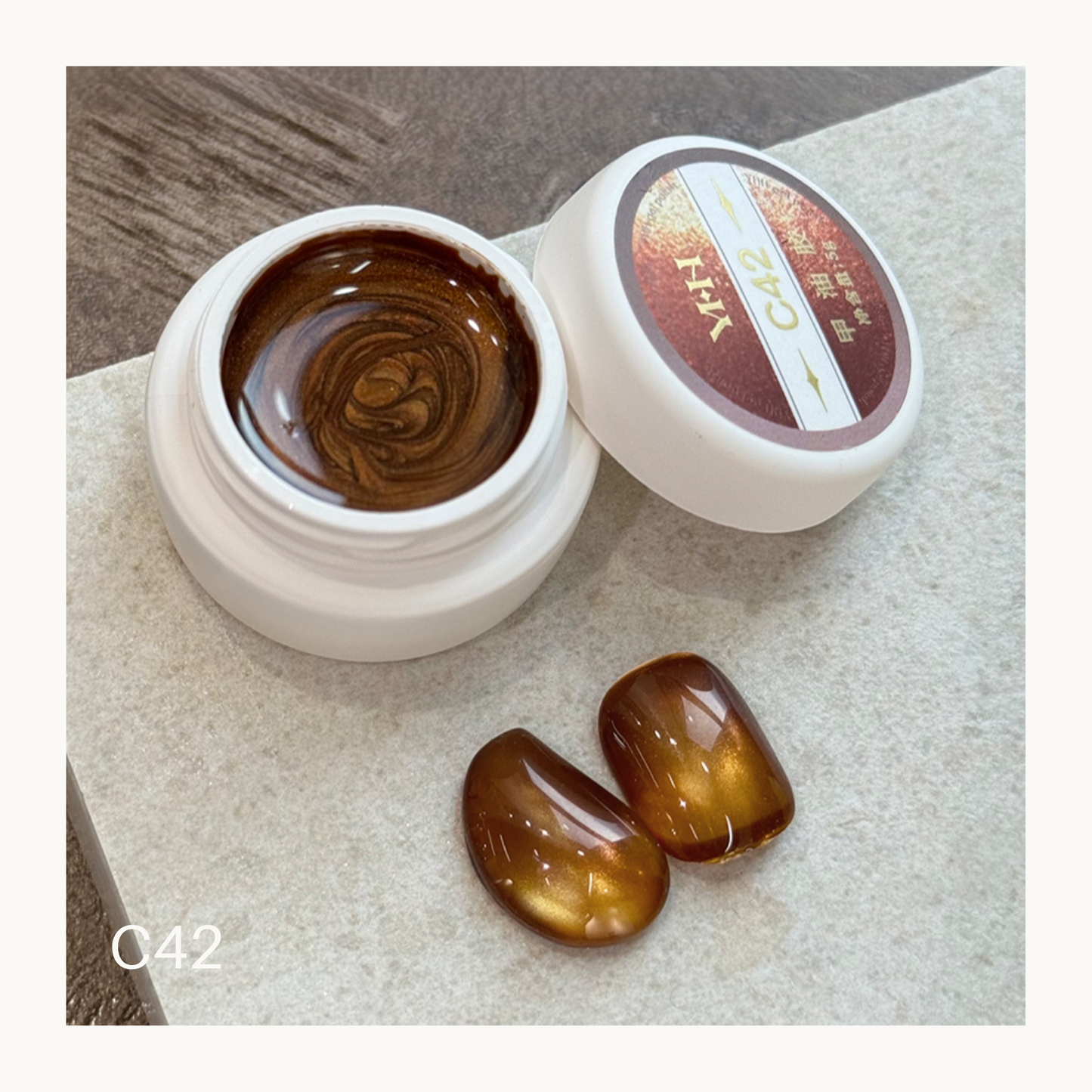 YHH C42 amber gold cat eye gel, warm honey magnetic nail gel with luminous reflective shimmer swatch