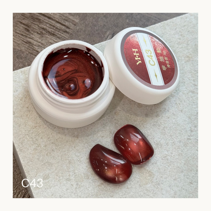 YHH C43 burnt ruby red cat eye gel, deep metallic magnetic nail gel with glowing wine red shimmer swatch
