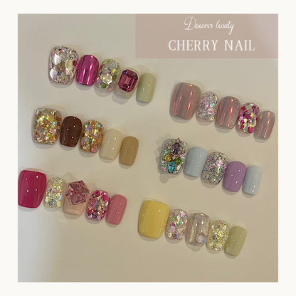 Cherry Nail Aurora Dream Glitter Collection displayed on multiple nail design samples featuring iridescent chunky glitter nail art with salon luxury finish