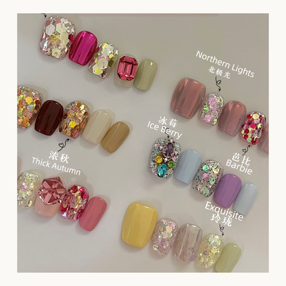 Cherry Nail Aurora Dream Glitter Collection used in seasonal nail art designs featuring encapsulated chunky glitter, chrome accents, and luxury salon nail styles