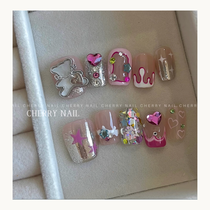 Cherry Nail Little Pico Star mixed glitter used in full nail art set with star, heart and iridescent decoration elements