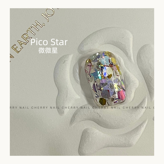 Cherry Nail Little Pico Star mixed glitter applied on nail tip showing iridescent star, heart and flake nail art design