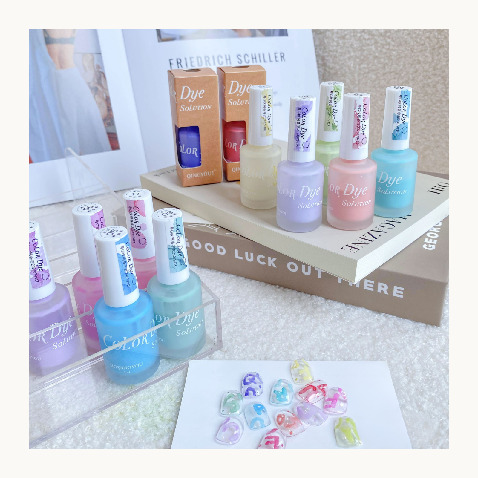 pastel color dye solution 12-color watercolor nail ink bottles and nail art samples displayed on books