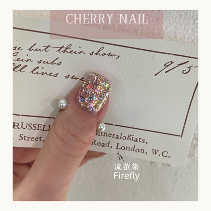 Detailed shot of Firefly multi-color holographic glitter flakes for nails and crafts.