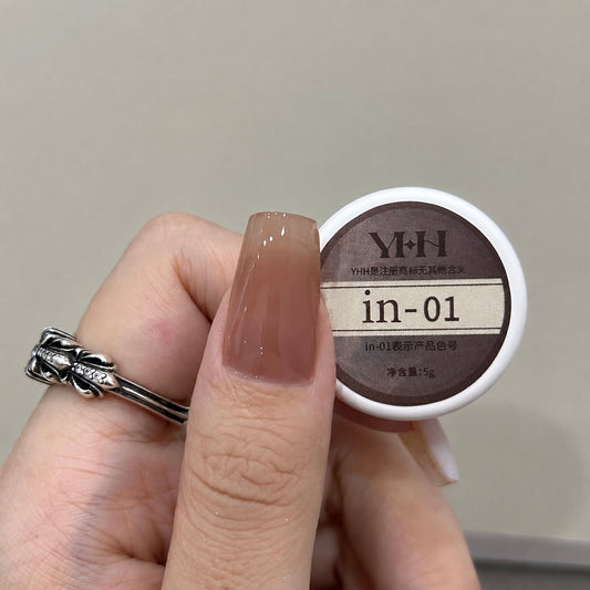 Nude nail color gel applied beside the in-01 gel pot