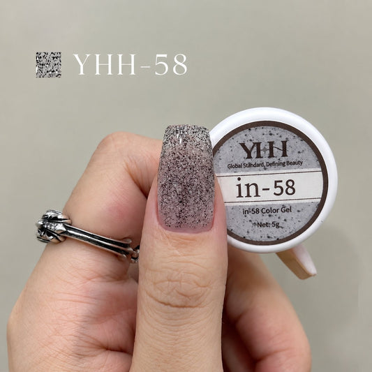 Gray glitter nail color gel sample on a painted nail