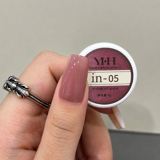 Dusty rose nail color gel applied beside the in-05 gel pot