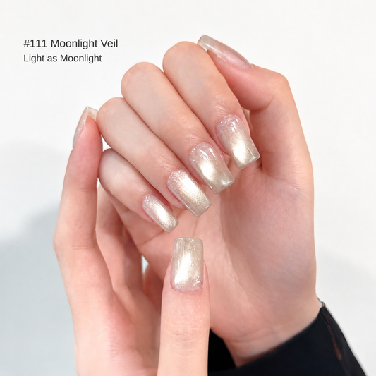Sheer gold pearl glitter nail color gel manicure on one hand