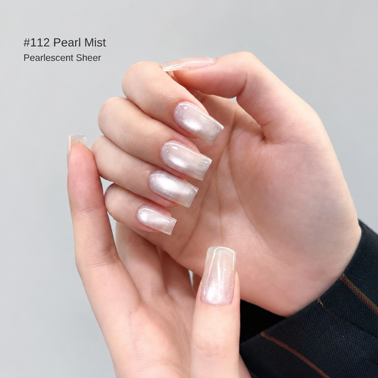 Sheer white pearl shimmer nail color gel manicure on one hand