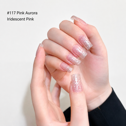 Translucent pink sparkle nail color gel manicure on one hand