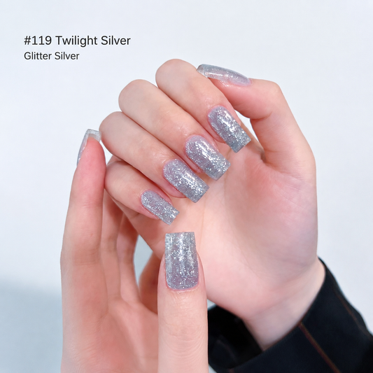 Cool silver-gray glitter nail color gel manicure on one hand