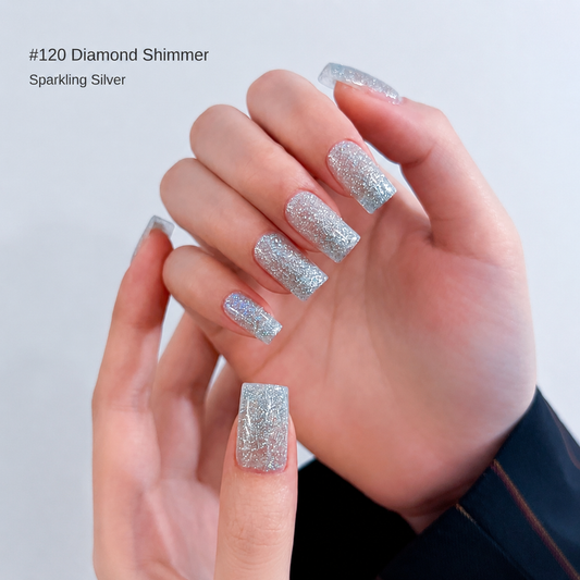 Bright silver glitter nail color gel manicure on one hand