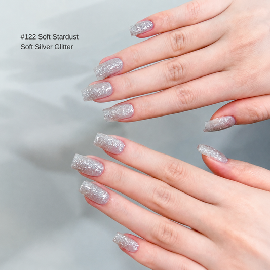 Soft silver glitter nail color gel manicure on two hands