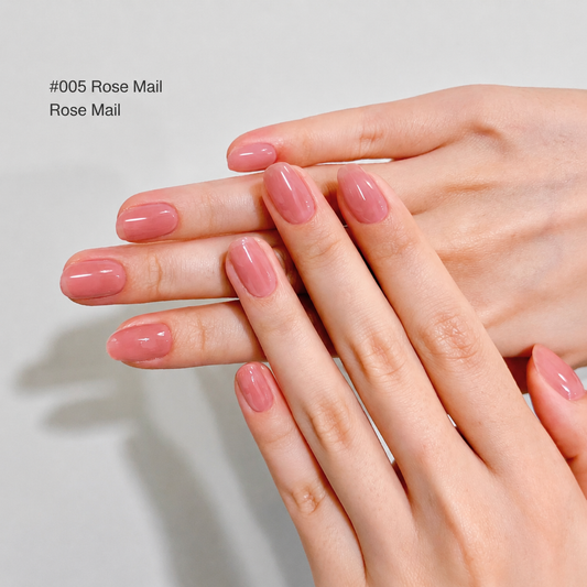Rose Mail muted rose glossy nail color gel manicure on overlapping hands